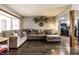 Inviting living room with hardwood floors, neutral tones, and a comfortable sectional sofa at 2965 E 1100 N, Pendleton, IN 46064