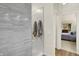 Stylish shower with tiled walls and modern fixtures, seamlessly blending functionality with design at 3033 Daum Ct, Carmel, IN 46033