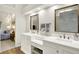 Elegant bathroom featuring dual vanities, modern fixtures, and a sleek design at 3033 Daum Ct, Carmel, IN 46033