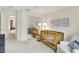 Neutral Bedroom with light carpet, white walls, crib, accent chair, and decorative wall art at 3033 Daum Ct, Carmel, IN 46033