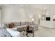 Bright, open living room with plush seating and neutral color palette at 3033 Daum Ct, Carmel, IN 46033
