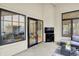 Covered porch with comfortable seating and a television with views to the outside at 3033 Daum Ct, Carmel, IN 46033