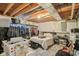 Open basement features a bed, closet space for clothing, and natural light at 3267 Cimmaron Ash Ct, Zionsville, IN 46077