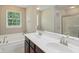 Bathroom featuring a soaking tub and double vanity at 3267 Cimmaron Ash Ct, Zionsville, IN 46077