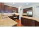 Modern kitchen features granite countertops, stainless appliances, and ample storage space at 3267 Cimmaron Ash Ct, Zionsville, IN 46077