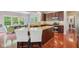 Spacious kitchen features a large island with seating and stainless steel appliances at 3267 Cimmaron Ash Ct, Zionsville, IN 46077