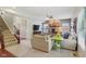 Comfortable living space featuring a fireplace, plush seating, and large windows, ideal for Gathering gatherings at 3267 Cimmaron Ash Ct, Zionsville, IN 46077