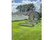 Spacious backyard with garden boxes, white fence, and storage shed at 3559 S County Road 475 E, Plainfield, IN 46168