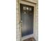 Stylish front door with a window, ring doorbell, and decorative Welcome mat at 3559 S County Road 475 E, Plainfield, IN 46168