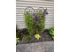 Landscaped side yard featuring flowers, and paver sidewalk at 3559 S County Road 475 E, Plainfield, IN 46168