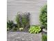 Landscaped side yard featuring flowers, and paver sidewalk at 3559 S County Road 475 E, Plainfield, IN 46168