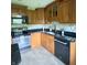 Functional kitchen with stainless steel appliances, granite countertops, and ample cabinet space at 3559 S County Road 475 E, Plainfield, IN 46168