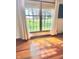 A window view in a room with natural lighting and hardwood floors at 3559 S County Road 475 E, Plainfield, IN 46168