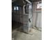Basement featuring a Duanee HVAC system and exposed framing at 3644 N Parker Ave, Indianapolis, IN 46218