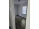 Bright bedroom with hardwood flooring and natural light from a window at 3644 N Parker Ave, Indianapolis, IN 46218