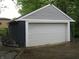 Spacious detached garage with ample parking space, and blue and gray exterior at 3644 N Parker Ave, Indianapolis, IN 46218