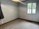 Bedroom with updated carpet, a window that provides natural light at 3645 Winings Ave, Indianapolis, IN 46221