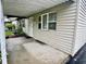 Home exterior featuring a covered porch and charming curb appeal at 3645 Winings Ave, Indianapolis, IN 46221