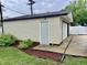 Exterior view of a one car garage with side entry door at 3645 Winings Ave, Indianapolis, IN 46221