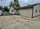 Exterior view of the detached garage and the rear of the house at 3645 Winings Ave, Indianapolis, IN 46221