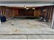 Clean garage interior with unfinished wooden walls and concrete floor at 3645 Winings Ave, Indianapolis, IN 46221