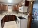 Cozy kitchen featuring ample cabinet space, modern appliances, and stylish tiled backsplash at 3645 Winings Ave, Indianapolis, IN 46221