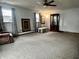 Spacious living room featuring neutral walls, updated carpet, and plenty of natural light at 3645 Winings Ave, Indianapolis, IN 46221
