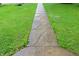 Stone walkway to home with beautiful grass on each side at 3702 N Chester Ave, Indianapolis, IN 46218