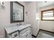 Elegant bathroom with marble countertops, modern fixtures, and tiled shower at 38 Hawthorne Ct, Carmel, IN 46033