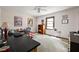 Bright bedroom with natural light, ceiling fan, and gray carpet at 38 Hawthorne Ct, Carmel, IN 46033