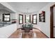 Charming breakfast nook with hardwood floors and many windows at 38 Hawthorne Ct, Carmel, IN 46033