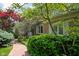 Charming brick home with well-manicured landscaping, showcasing a welcoming entrance and vibrant curb appeal at 38 Hawthorne Ct, Carmel, IN 46033
