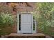 Inviting front entrance with brick archway and well-maintained landscaping at 38 Hawthorne Ct, Carmel, IN 46033