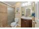 Updated bathroom featuring a tiled shower, vanity, and framed mirror at 4256 Zachary Ln, Westfield, IN 46062