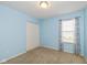 Spare bedroom with a window and double door closet at 4256 Zachary Ln, Westfield, IN 46062