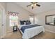 Comfortable bedroom featuring a vaulted ceiling, fan, and stylish decor at 4256 Zachary Ln, Westfield, IN 46062