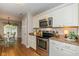 Well-equipped kitchen with stainless steel appliances and bright white cabinetry at 4256 Zachary Ln, Westfield, IN 46062