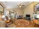 Spacious living room with high ceilings, fireplace, and views of dining area and kitchen at 4256 Zachary Ln, Westfield, IN 46062