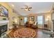 Bright living room featuring a fireplace, stylish decor, and comfortable seating at 4256 Zachary Ln, Westfield, IN 46062