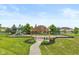 Community playground featuring a playset, swing set, and wooden structure at 4256 Zachary Ln, Westfield, IN 46062