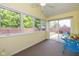Bright sunroom with multiple windows offering serene views of the backyard at 4256 Zachary Ln, Westfield, IN 46062