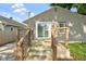 Wooden deck with stairs offers a seamless transition to the backyard and complements the house's exterior at 4359 Winthrop Ave, Indianapolis, IN 46205