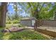 Charming backyard features a garage, deck, and inviting lawn at 4359 Winthrop Ave, Indianapolis, IN 46205