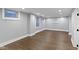 Spacious basement area featuring recessed lighting and wood-look flooring for flexible living or storage at 4359 Winthrop Ave, Indianapolis, IN 46205