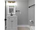 Tastefully updated bathroom boasts a modern vanity, sleek fixtures, and neutral color palette at 4359 Winthrop Ave, Indianapolis, IN 46205