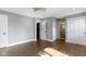 This bedroom provides two closets and two doorways for flexible layout options at 4359 Winthrop Ave, Indianapolis, IN 46205