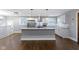 Bright kitchen featuring granite countertops, stainless steel appliances, and a stylish kitchen island at 4359 Winthrop Ave, Indianapolis, IN 46205