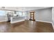 Open kitchen featuring stainless steel appliances, granite countertops, and stylish pendant lighting at 4359 Winthrop Ave, Indianapolis, IN 46205