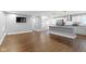 Bright, open living space with hardwood floors, a modern kitchen, and natural light at 4359 Winthrop Ave, Indianapolis, IN 46205