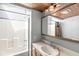 This bathroom features a single sink, shower and bathtub combination at 4622 S Franklin Rd, Indianapolis, IN 46239